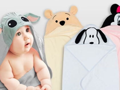 baby with hooded towels
