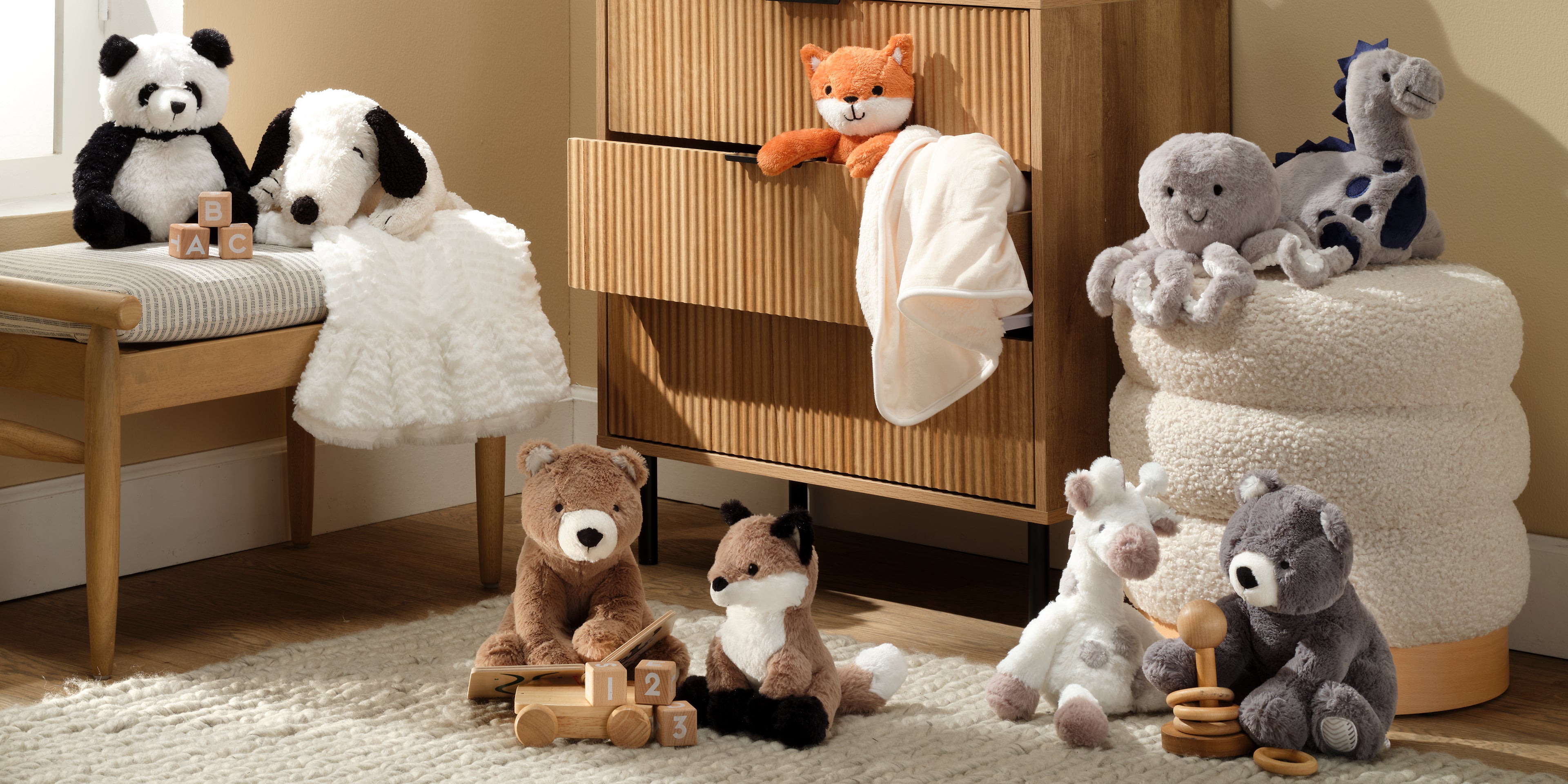 Plush Stuffed Animals Spread throughout a Nursery