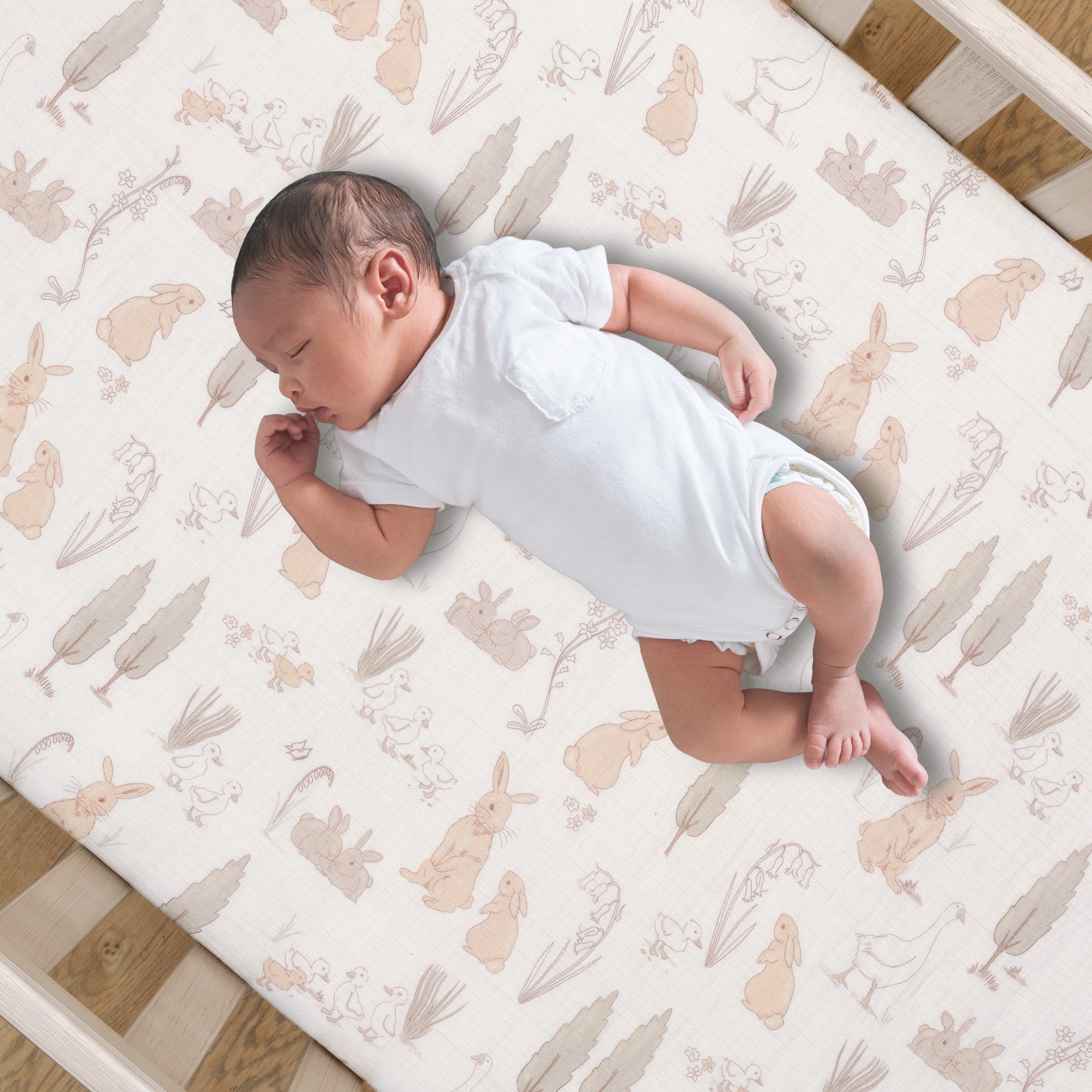 Bunny Hop Organic Cotton Muslin Crib Sheet by Lambs & Ivy