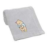 Winnie the Pooh Hugs Baby Blanket by Lambs & Ivy