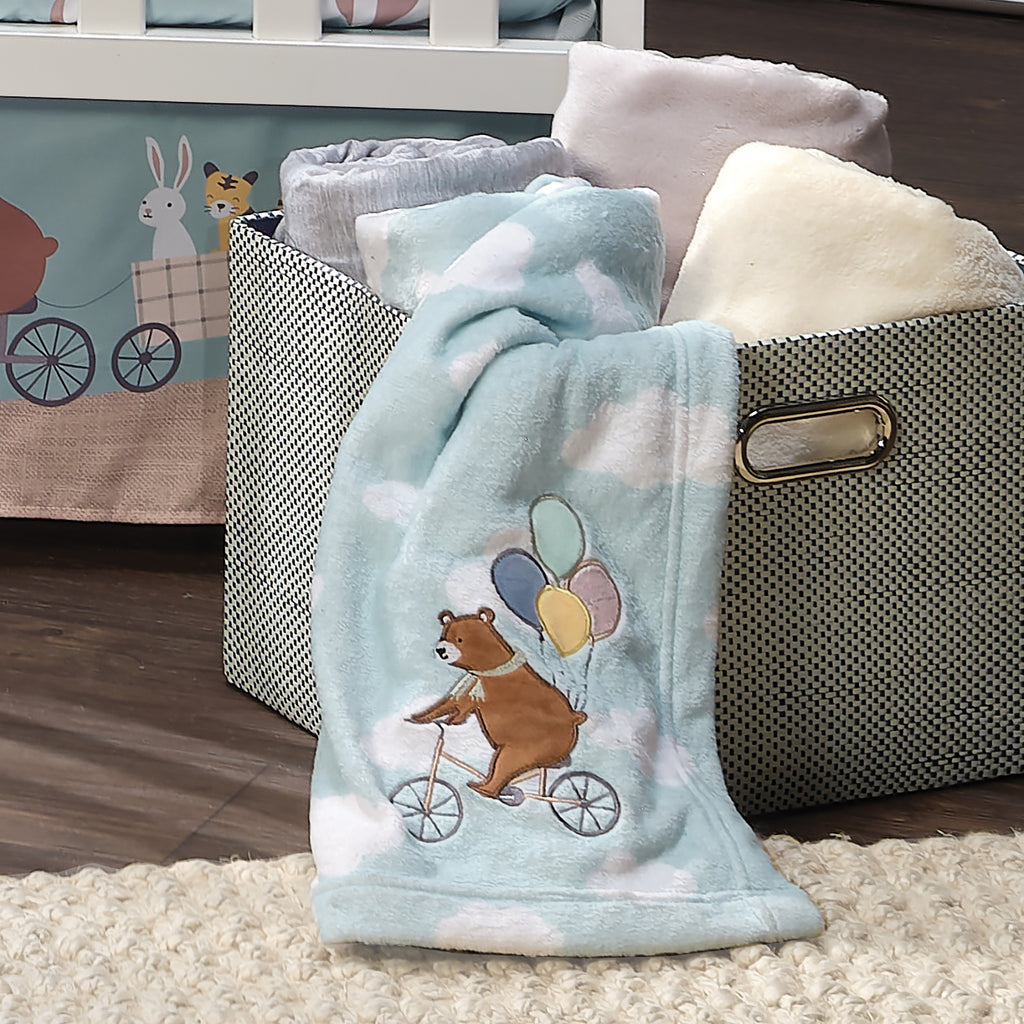 https://lambsivy.com/cdn/shop/products/up-up-and-away_blanket_lifestyle_1024x1024.jpg?v=1658179320